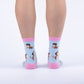 pink and blue socks with a dog holding a cocktail and wearing sunglasses 