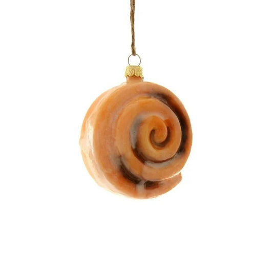 decorative glazed cinnamon roll ornament on white background 