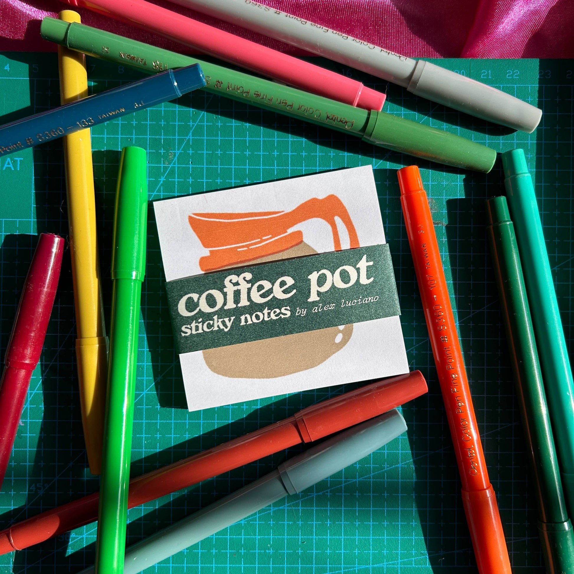 Sticky note pad with an old school diner coffee pot design on it 