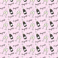 roll of wrapping paper that has a pink background with a continuous pattern of a champagne bottle, two flutes clinking and the text "congrats" all over 