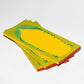 green and yellow notepad, designed with a risograph print of an ear of corn with husk on it 