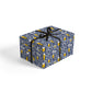 Gift box wrapped with craft beer themed wrapping paper tied with a black ribbon 