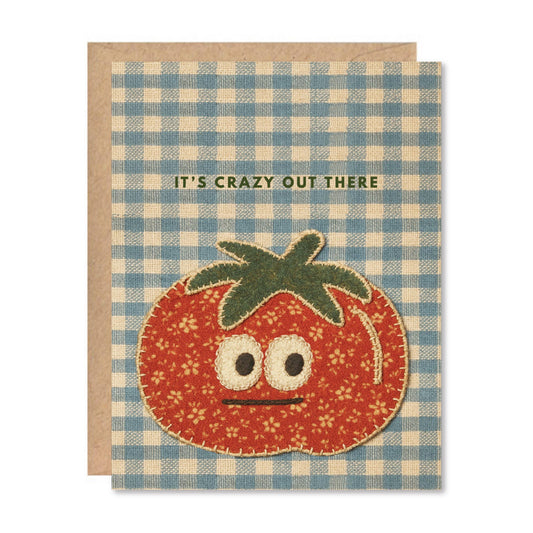 Card with a tomato illustration on a blue checkered pattern and text that says "It's crazy out there" 