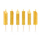Six birthday candles shaped like crinkle fries on a white background