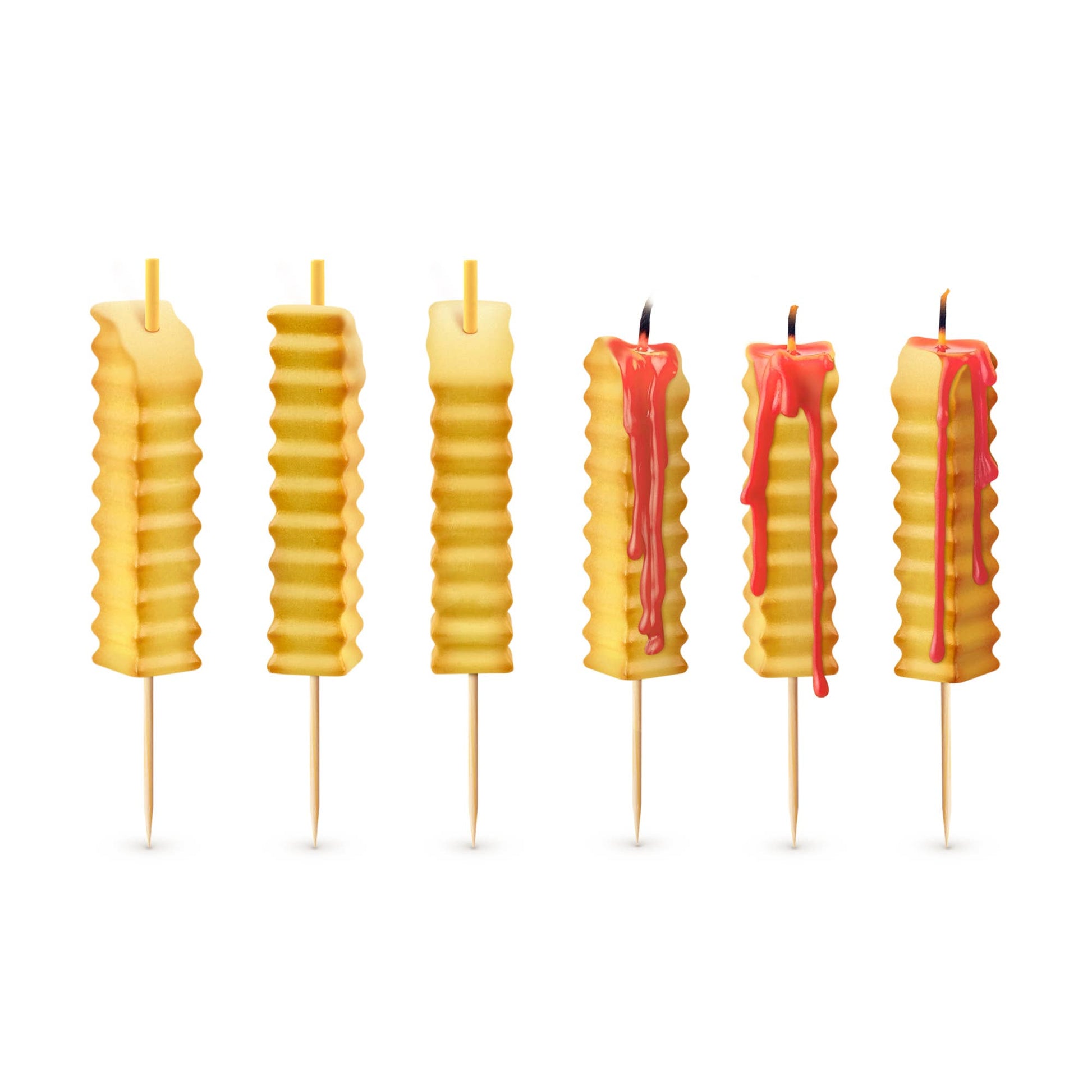 birthday candles resembling french fries with a white background. Candle melt red wax when lit 