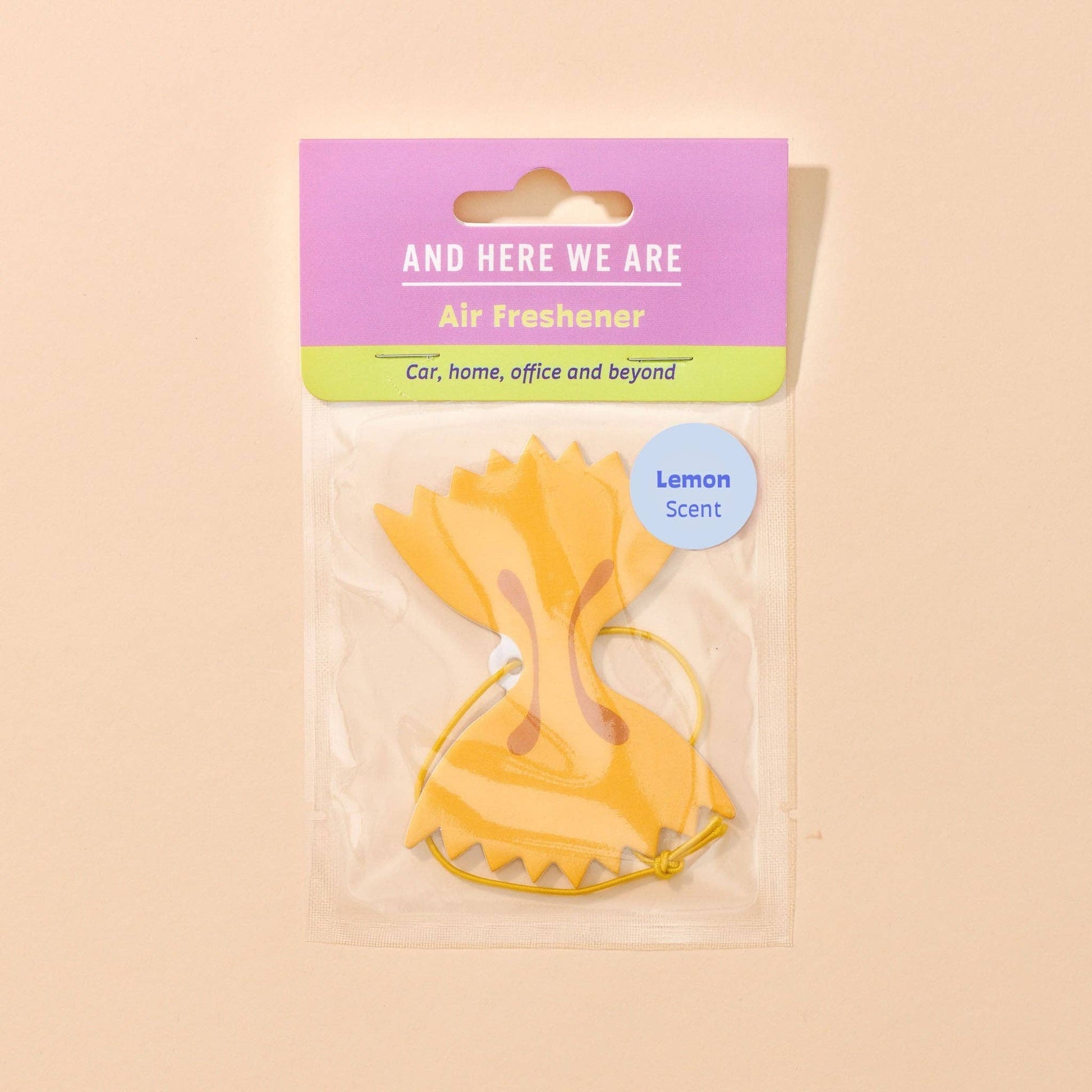 Car air freshener made to look like farfalle (bowtie) pasta in packaging 