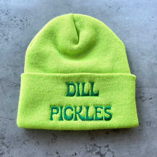 Lime green knit beanie hat with "Dill Pickles" embroidered in emerald green font.