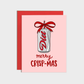 Card with a diet soda graphic and 'Diet' text on the can, featuring a red bow and text that says "merry crisp-mas" on a pink background.