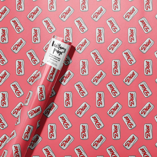 Roll of wrapping paper with a Diet Coke can design all over on a red background 