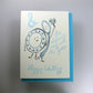 Wedding card with blue and white design and a dish and spoon illustration on a gray background