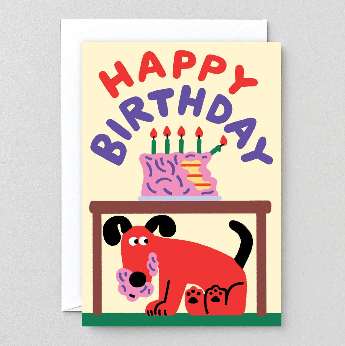 birthday greeting card with illustration of a cake on top of a table with a mischievous dog underneath with frosting all over it's mouth