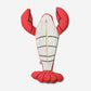 Red pouch shaped like a lobster on a white background. Photo is showing it's underside