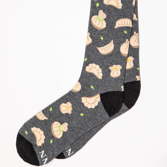 dark grey socks with dumpling pattern all over it 