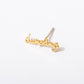 Single 14k gold plated stud earring -- reads "dumpling" in handwritten script