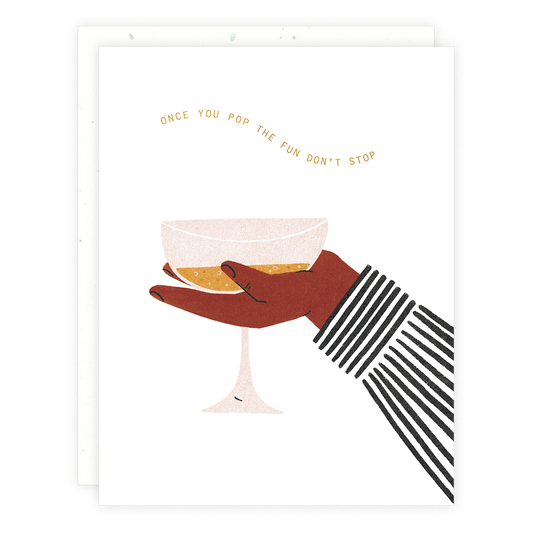 Greeting card with illustration of a hand holding a champagne coupe. Text reads "Once you pop the fun don't stop" 