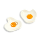 Two egg-shaped ceramic plates with egg designs on a white background