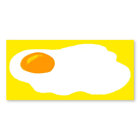 Notepad with an illustration of a fried egg on a yellow background