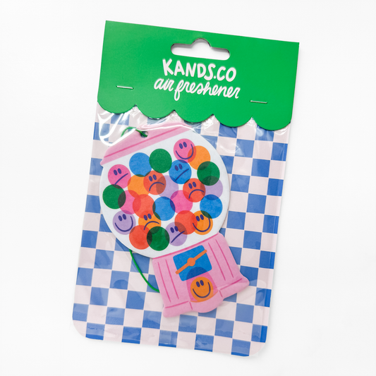 KANDS.CO air freshener packaging with a checkered pattern
