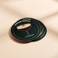 Two Coasters with Espresso Martini design on a beige background