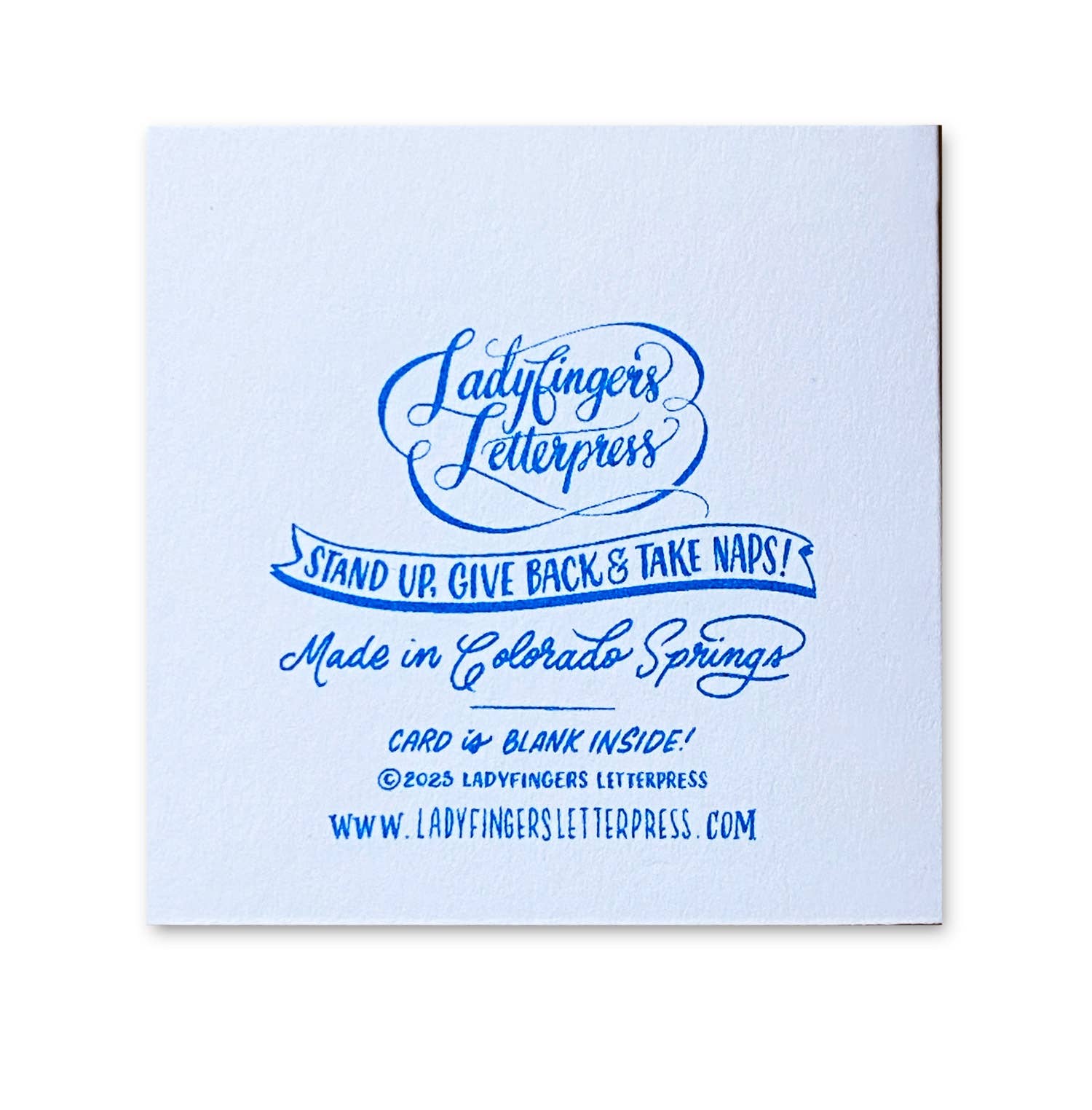 back of espresso tiny card with branding and copyright information 