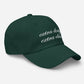 Green cap with 'extra dirty extra olives' text on a light gray background