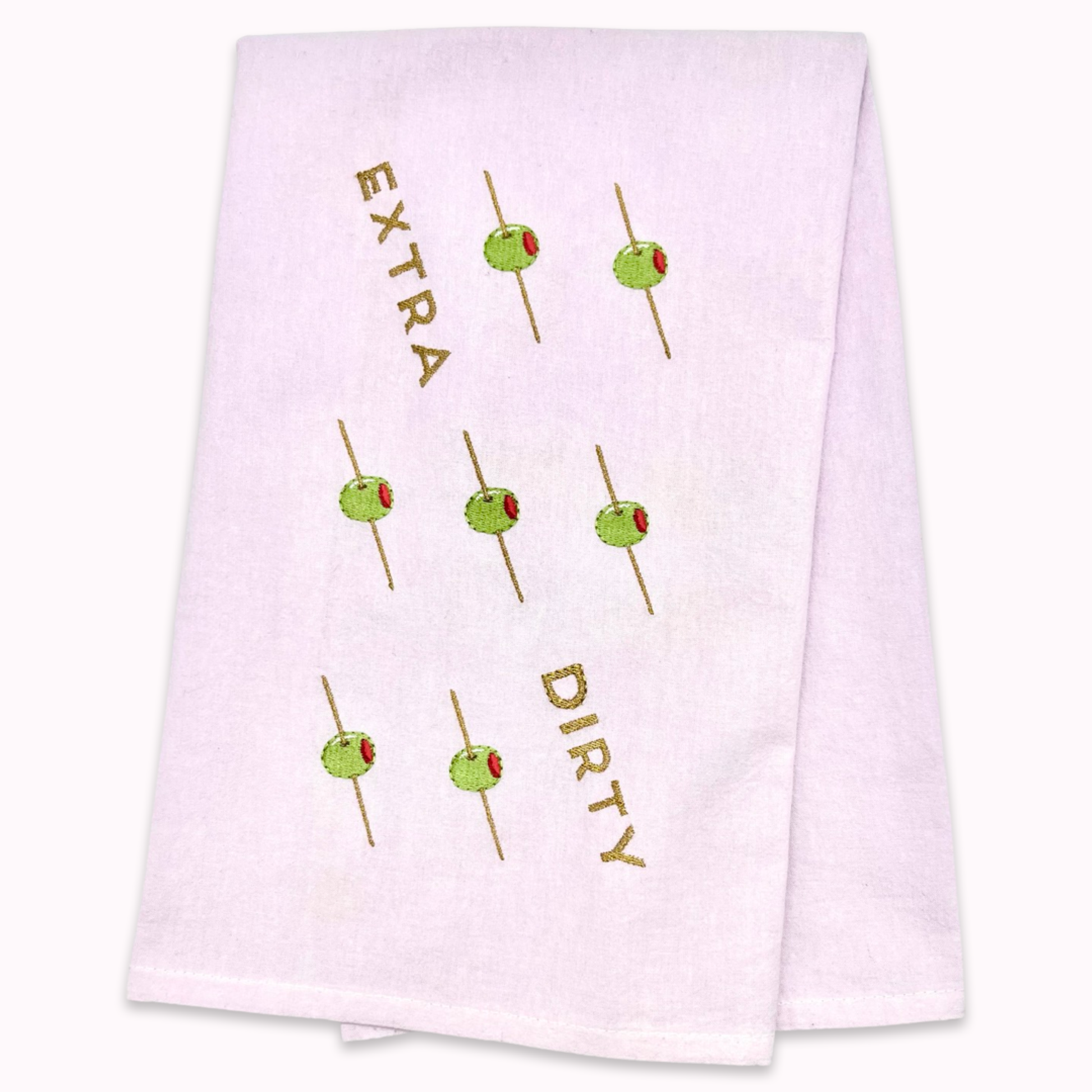 White kitchen towel with skewered olives design and text "extra dirty" on a white background
