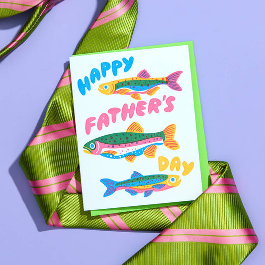 Father's Day card with colorful fish illustrations on a green tie with pink stripes.