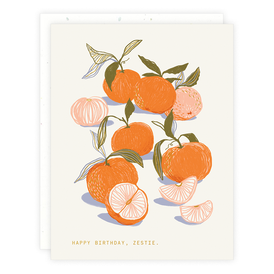 Greeting card with illustrations of tangerines with text that reads "Happy birthday, zestie"