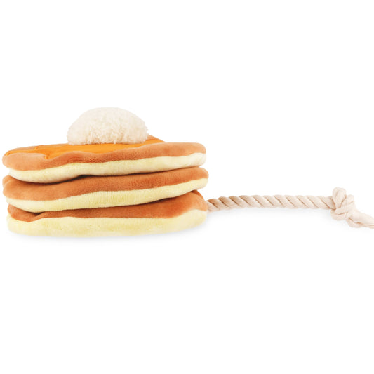 Dog toy of a stack of pancakes with a rope on a white background