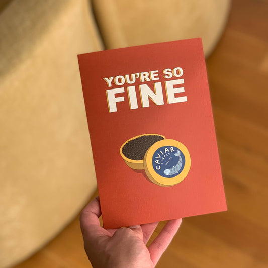 Caviar greeting card -- deep brown/red card with a gold tin of caviar on it and text that reads "You're So Fine" in bold, block letters. 