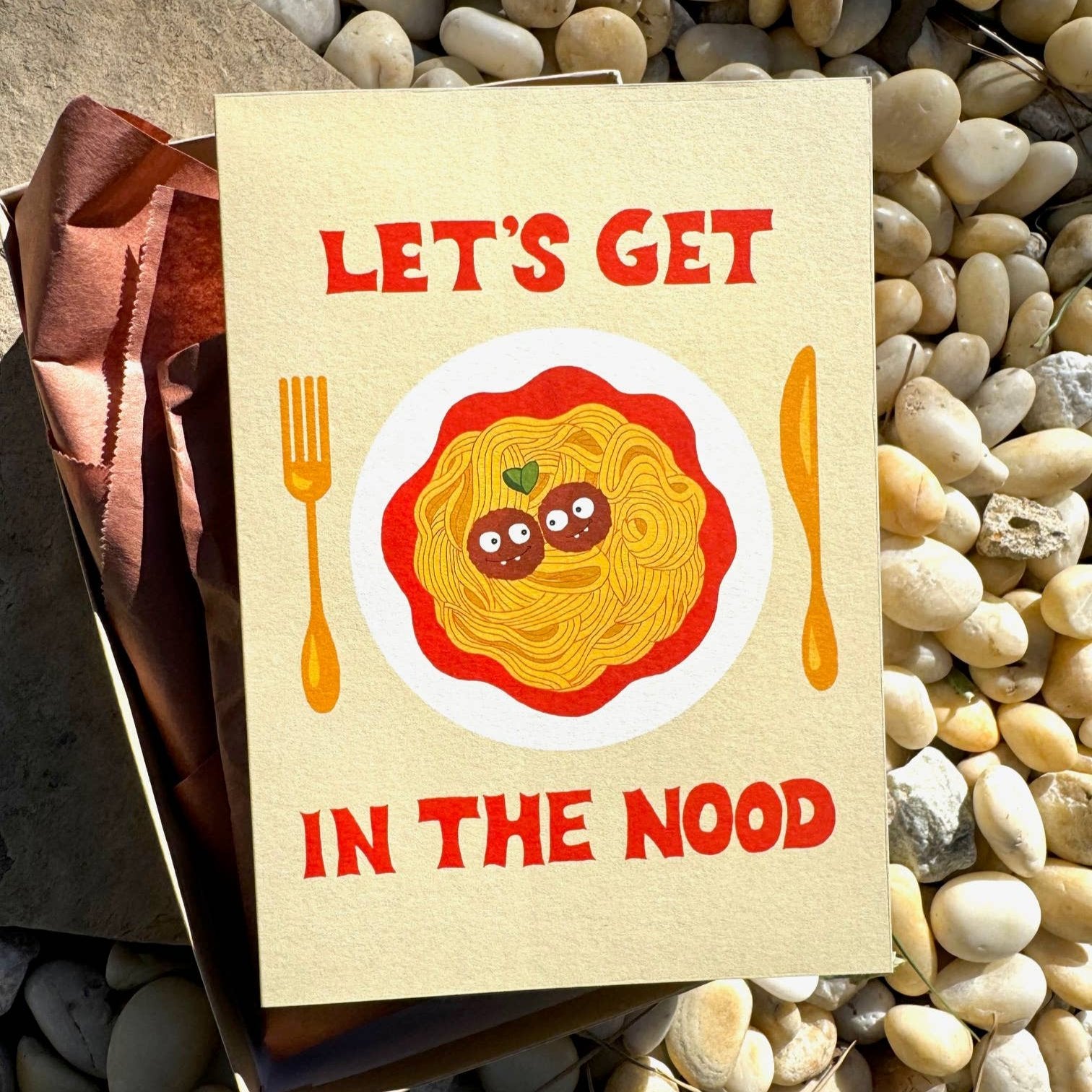 Greeting card that reads "Let's Get in the Mood" with a plate of spaghetti and meatballs and a knife and fork 