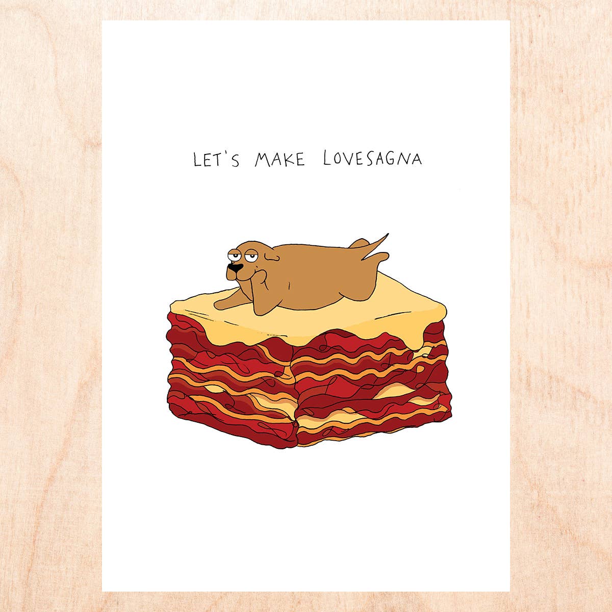 Greeting card with a dog laying on top of a slice of lasagna. Text reads "Let's make lovesagna" 