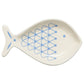 Fish-shaped plate with blue geometric pattern on a white background