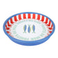 Round dish with red, blue and white striped rim and 'Fruits de Mer' text and fish illustrations.
