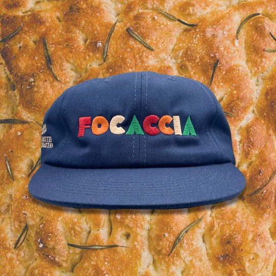 Blue Dad Hat with "FOCACCIA" embroidered in colorful, vintage font.