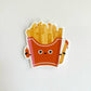 Sticker of a cute cartoon-style French fry container with fries on a white background