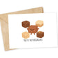 Greeting card with fudge illustrations and a brown envelope on a white background. Text reads "You're the fudging best" 