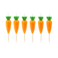Set of carrot-shaped candles with green tops on a white background
