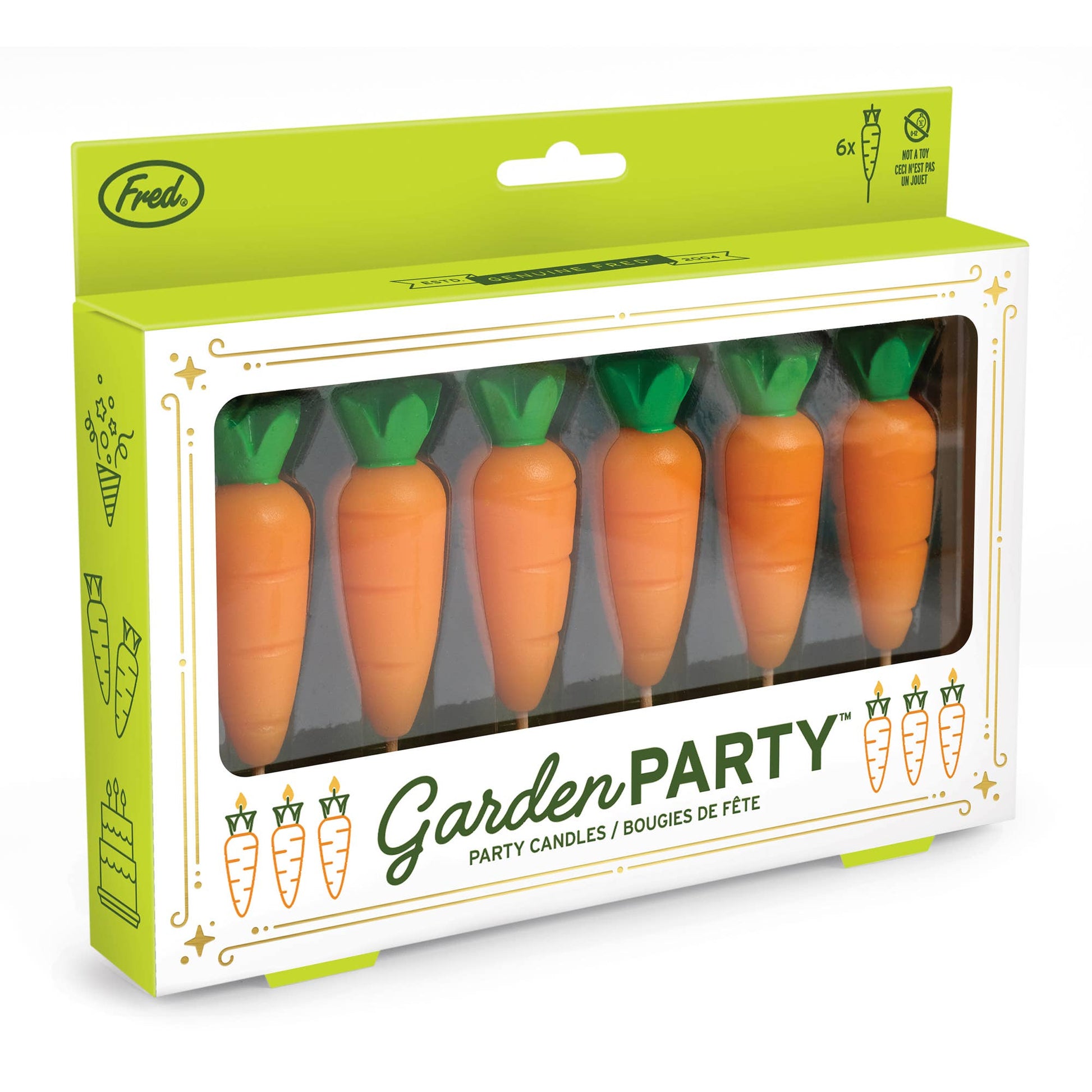 Box of carrot-shaped candles with green tops, labeled 'Garden Party' by Fred.