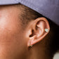 garlic stud earring on upper ear 