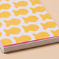 close up details of the goldfish pocket notebook 