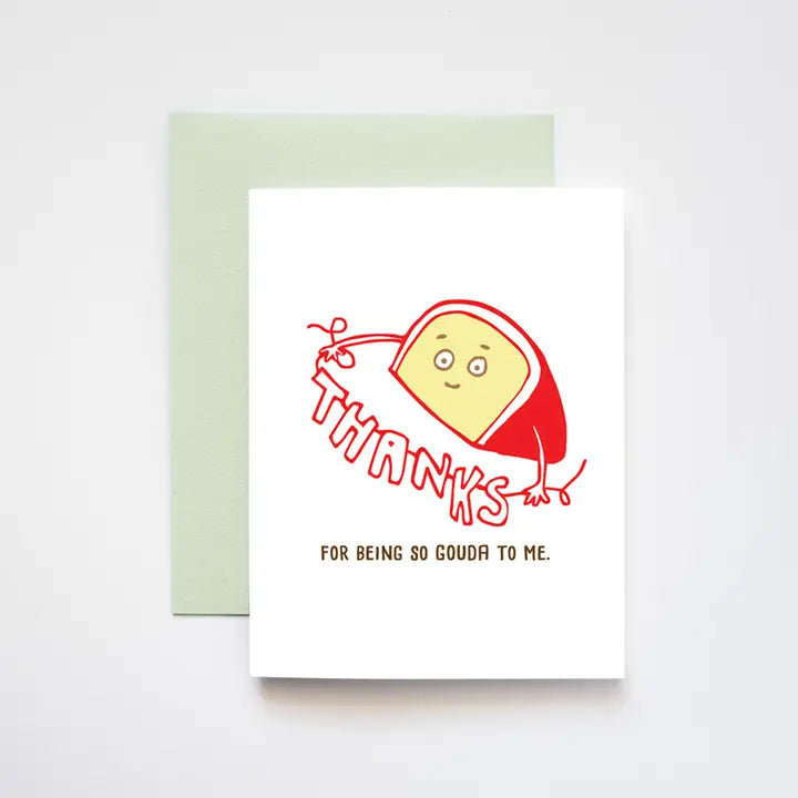 Greeting card with a cartoon cheese character and text on a white background. Says, "thanks for being so gouda to me" 