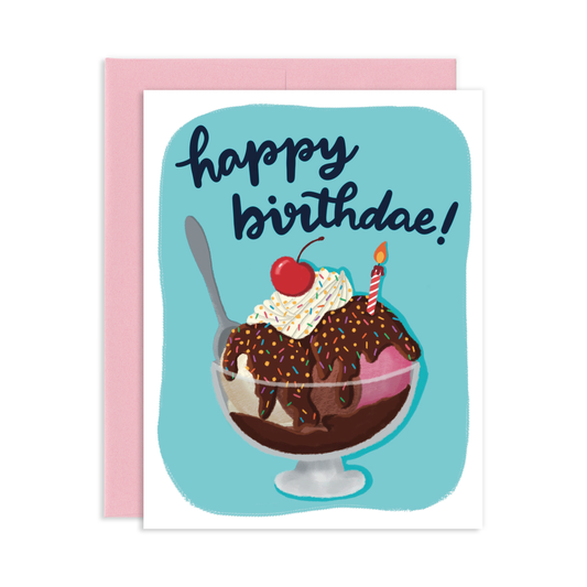 birthday greeting card with an illustration of an ice cream sundae on it. Text reads "happy birthdae!"