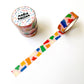 Colorful washi tape with gummy bear design and a cylindrical container on a white background