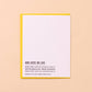 White card with black branding text on a beige background