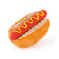 Plush hot dog toy with mustard on a white background