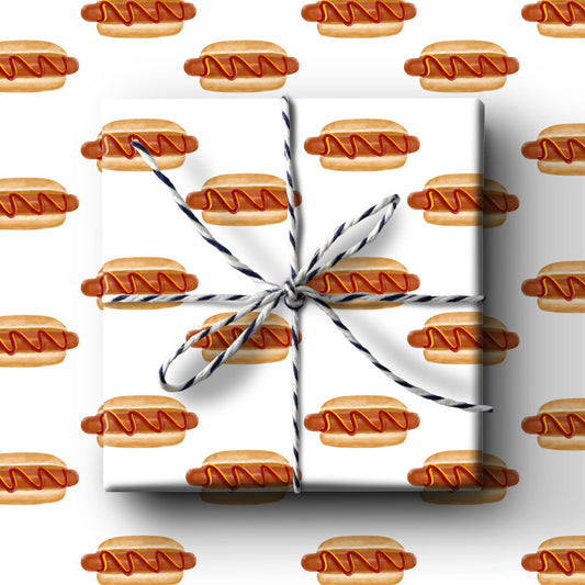 Gift box wrapped in paper with hot dog pattern