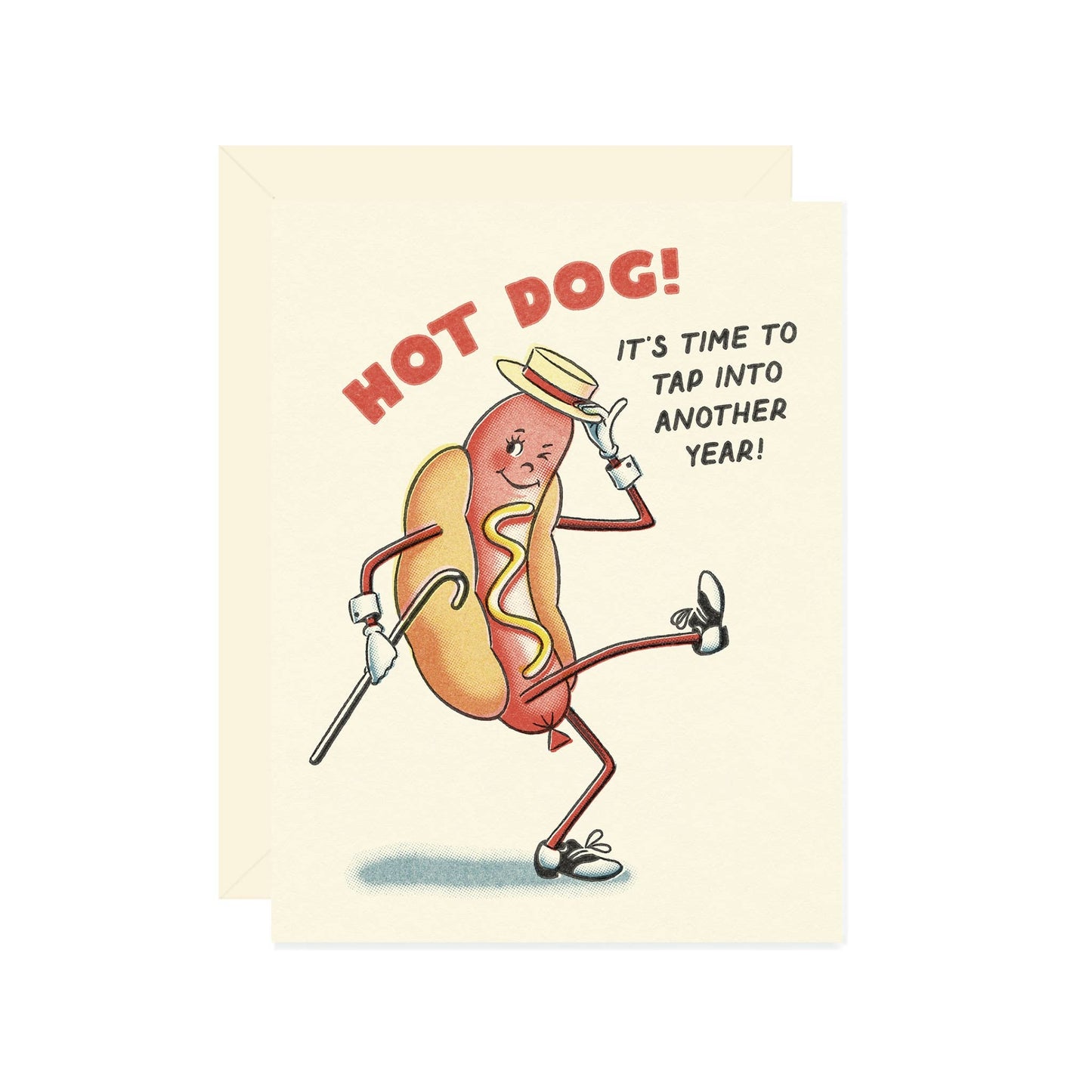 Card with a cartoon hot dog character tap dancing and text "hot dog! it's time to tap into another year!" on a beige background