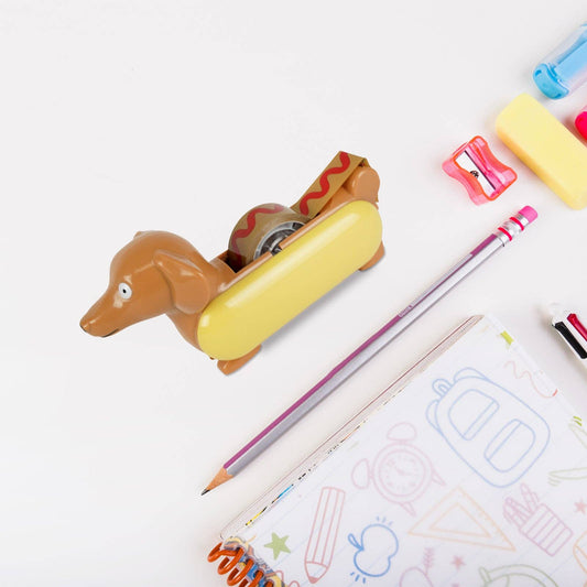 hot dog tape dispenser on desk with other office supplies for scale 