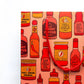 Pattern of hot sauce bottles and jars on a pink background with a red strap.